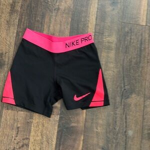 Pink Nike pros